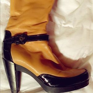 Brown and Black Fendi boots
